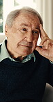 Thinking, serious and senior man in home with worry, regret and concern for onset dementia. Elderly person, reflection and stress in house with bad memory, retirement risk and alzheimers symptoms