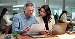 People, finance and laptop with documents in office for accounting, company budget or expenses. Businessman, woman or employees with paperwork or computer for financial planning together in workplace