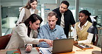 Team, meeting and businessman with laptop for project discussion, brainstorming or planning. Man, employees or colleagues talking with computer for collaboration, tasks or sharing ideas in workplace