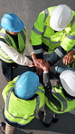 Architect, solidarity and hand stack with team, above or motivation for project on construction site. Civil engineer, support and collaboration with colleagues, agreement and cooperation with people