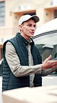 Outdoor, delivery man and frustrated at van for logistics dispute, loading error and transit delay. Transport, worker and stress with colleague for package damage, vehicle overload or courier service