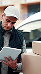 Tablet, typing and delivery man with boxes for shipping, digital schedule and dispatch notification. Check, technology and logistics for cargo service, distribution and online courier database app