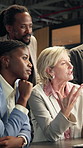 Discussion, meeting or business people in office for collaboration, advice or sharing ideas. Group, employees or conversation with colleagues for project planning, strategy or suggestion in workplace