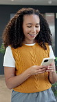 Happy, woman and walk in office with phone, typing text message and check online schedule for work. Person, smile and send email in business with tech, review job calendar and digital communication.