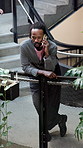 Businessman, staircase and discussion with phone call for negotiation, communication or chat. Man, employee or agent talking on stairs for business conversation, project proposal or idea in workplace