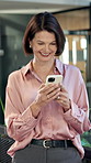 Happy, business and woman in office with phone, research and email client for viewing schedule. Mature person, laugh and reading with mobile app, buyer inquiry and pricing property for auction offer