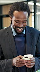 Smile, business and black man in office with phone, research and email client for viewing. Happy, realtor and mobile in workplace for negotiation, buyer inquiry and pricing property for auction offer