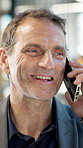 Phone call, chat or man in office with smile, campaign brief or client discussion on creative pitch. Talk, happy or mature brand advisor with tech, ad feedback or conversation on marketing proposal.