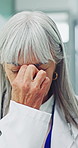 Woman, burnout and doctor with stress in hospital for bad news or negative patient results. Migraine, fatigue and mature healthcare worker with headache for mistake, error or medical fail in clinic.