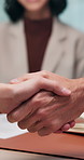 Handshake, people and welcome in office for interview, recruitment and human resources agreement. Candidate, shaking hands and hiring with job offer, opportunity and document for onboarding process