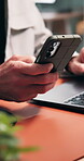 Hands, laptop and businessman scroll on mobile for record keeping, finance app and auditing. Tech, accountant or phone in office for financial reporting, budget review or MFA code for income tracking