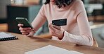 Phone, credit card and typing with hands of woman in home for digital transaction, account and password. Online shopping, ecommerce and fintech transfer with person in house for debit and checkout