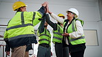 Architect, team and high five at site for construction, motivation and success of completed project. Smile, people and celebration with applause, collaboration and achievement of building development