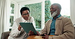Tablet, chat and search with old couple on sofa for communication, streaming and happy. Social media, relax and retirement with black man and woman in living room of home for technology and love
