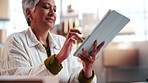 Woman, review and ecommerce startup with tablet, research and confirm order for stock control. Mature person, scroll or website in office with digital, inventory availability and catalog for delivery