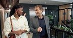 Talking, lobby and business people in office walking with greeting, conversation and arrive with team. Happy, workplace and workers in hallway for discussion, chat and meeting in morning at company