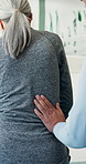 Physiotherapy, back pain and woman with senior patient for consulting, osteoarthritis and recovery. Healthcare, help and elderly person with arthritis for physical therapy, wellness and medical care