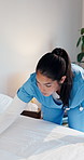 Cleaning, woman and nurse making bed in home for housekeeping service, hygiene or maintenance. Chores, medical assistance and caregiver with bedding in bedroom for hospitality in nursing facility.