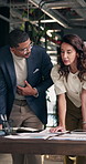Team, graph and business man with paperwork for finance review, investment and budget planning. Office, manager and people with chart, documents and research for financial report, profit and meeting