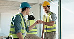 Construction, happy and people in building with fist bump for good job, renovation and site progress. Contractor, architecture and men with feedback for remodeling, support and infrastructure success