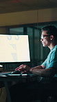 Night, computer and business man with chart for financial review, risk assessment and report. Office, screen and person on tech with graph, insight and research for finance, investment and stocks