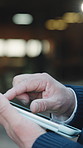 Tablet, man and logistics in warehouse with hands, research and supply chain for shipping. Typing, person or report review in depot with tech, schedule dispatch and inventory stock for distribution