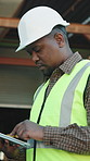 Tablet, black man and logistics in warehouse with scroll, research and supply chain for shipping. Serious, person or review in depot with tech, schedule dispatch and inventory stock for distribution