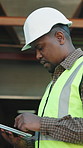 Tablet, black man and logistics in warehouse with review, research and supply chain for shipping. Serious, person or scroll in depot with tech, schedule dispatch and inventory stock for distribution