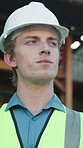Construction, thinking or man outdoor with observation, review or reflection in building evaluation. Inspection, below or serious supervisor with ppe, project perspective or operation plan on site.