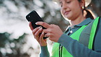 Cellphone, woman and hands of construction worker on site with email for feedback on building repairs. Tech, typing and civil engineer outdoor with cellphone for update on renovation or maintenance.