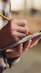 Hands, carpenter and writing with clipboard in warehouse for inspection, planning or agenda. Manufacturing, timber factory and person with checklist for workshop, safety and compliance with stock