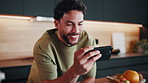 Smile, phone and tutorial with man in kitchen for recipe video, ingredients or online instructions. Cooking, preparation and search with male person in apartment for diet, health or nutrition in home