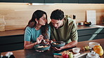 Couple, discussion and eating breakfast in kitchen with love, healthy food or nutrition for wellness. Married people, talk and morning meal in home with connection, bonding together or balanced diet.
