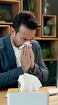 Sick, businessman or blowing nose with tissue in office for influenza, cold or flu in workplace. Man, employee or hayfever with toilet paper, bacteria or germ for sinus, allergy or virus on work desk