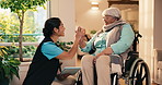 Caregiver, old woman and wheelchair with tablet for high five, conversation and progress in health. Nurse, pensioner with disability and talking with tech, treatment success and gesture for support