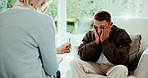 Psychology, stress and man in conversation with therapist for advice, healing or healthcare. Anxiety, communication and therapy with people in mental health clinic for ptsd or trauma counselling