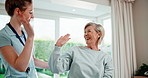 Physiotherapy, high five and senior woman with resistance band, physiotherapist and talking for advice. Laugh, healthcare and wellness with old patient at clinic for stretching, success and exercise