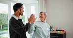 Physio, high five and senior woman with resistance band, physiotherapist and talking for advice. Man, healthcare and wellness with old patient at clinic for stretching, success and rehabilitation