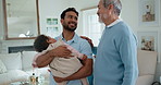 Senior, child and dad with adult son in home for parenting advice, comfort or bonding together. Elderly, kid and father talking with happy man, love or support for parenthood, help or care in house