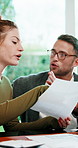 Disagreement, couple and paperwork in home for finance, expenses or asset management with taxes. Man, woman or argument with budget document with mistake, investment savings or debt error with bills 