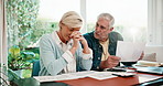 Mature, couple or discussion with finance in home for expenses, mortgage bills or debt together. Man, woman or conversation with documents or report for financial crisis or tax inflation in house