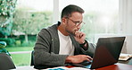 Thinking, online and man with laptop in home office, reflection or freelancer with financial report. Data analyst, typing and happy person with tech, remote work and planning for project in house