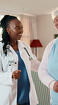 Doctor, dancing and old woman at house with smile, good news and celebrate for positive diagnosis. Happy, employee or senior person in home with rhythm, music therapy and moving for treatment success