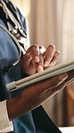 Hands, typing and nurse on tablet for medical service, research or support for healthcare career. Online, home and woman on tech for health report, treatment plan and schedule for assisted living