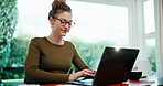 Freelancer, typing and woman with laptop in home office, calculation or financial report on website. Remote work, accountant and happy person with tech, online and budget with calculator in house