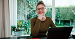 Freelancer, face and happy woman with laptop in home office, thinking or financial report on website. Remote work, accountant and person with glasses, reflection and smile with technology in house
