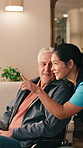 Wheelchair, old man and caregiver pointing in home for view, sensory stimulation and homecare. Happy, carer and senior person with disability for observing, conversation or curious in assisted living