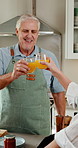Juice, toast and old couple in kitchen with cooking, healthy nutrition and bonding for relationship. Happy, married senior people eating and cheers in home with drink, food and retirement wellness.