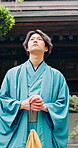 Idea, walking and yakata with Asian man in city for commute, journey or traditional clothing. Culture, thinking and travel with Japanese person outdoor in urban town for break, trip or vision