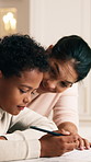 Home, help and mom with child for homework, learning assignment and answer for development. Family, happy and mother with boy for education, teaching and support for knowledge with assessment